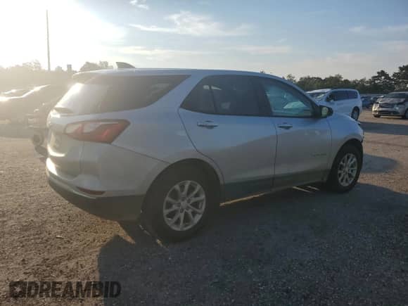 2018 Chevrolet Equinox LS с VIN 3GNAXHEV5JS592094, выставлен на аукционе Copart как лот 71883555 с пробегом 197 686 миль миль и Списание • Salvage title. История ставок и продаж доступна на DreamBid. Изображение 3.