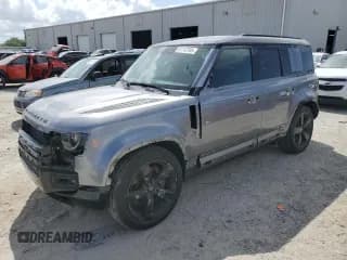 ✅ 2023 Land Rover Defender X-Dynamic SE • VIN: SALE27EU7P2187183 • Lot: 51112705. Listed on Copart with 23,105 mi. Free auction sales archive from the USA and detailed vehicle history report at DreamBid. Image 1.