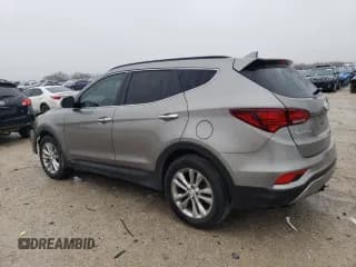 ✅ 2018 Hyundai Santa Fe 2.0T • VIN: 5XYZU4LA4JG536212 • Лот: 39029963. Опубликован ранее на Copart с пробегом 74 993 миль. Бесплатный доступ к архиву аукционных продаж из США и подробный отчёт об истории автомобиля на DreamBid. Изображение 2.