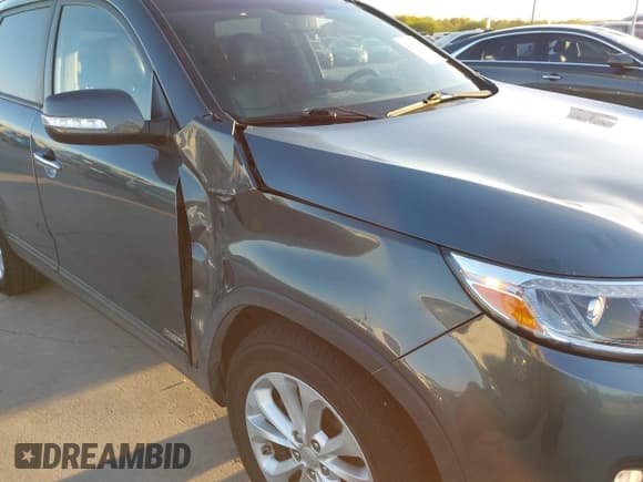 ✅ 2014 Kia Sorento EX • VIN: 5XYKUDA78EG544425 • Lot: 43697704. Listed on IAAI with 125,981 mi. Free auction sales archive from the USA and detailed vehicle history report at DreamBid. Image 6.