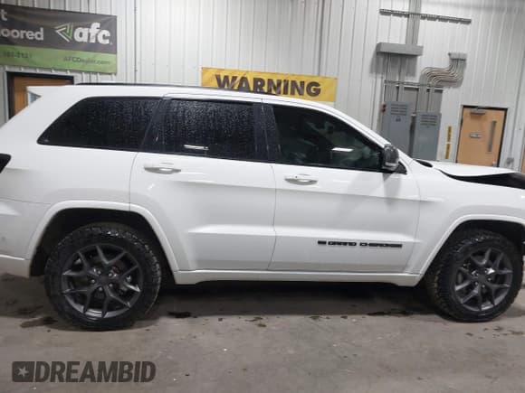 ✅ 2021 Jeep Grand Cherokee Limited • VIN: 1C4RJFBG1MC856431 • Лот: 43133253. Опубликован ранее на IAAI с пробегом 25 088 миль. Бесплатный доступ к архиву аукционных продаж из США и подробный отчёт об истории автомобиля на DreamBid. Изображение 13.
