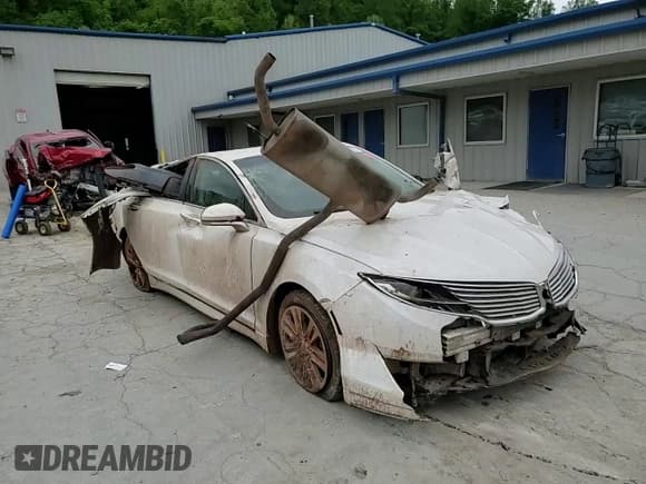 ✅ 2014 Lincoln MKZ Hybrid • VIN: 3LN6L2LU3ER833502 • Lot: 55996595. Listed on Copart with Not provided. Free auction sales archive from the USA and detailed vehicle history report at DreamBid. Image 13.