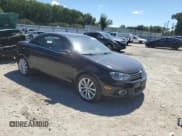 ✅ 2013 Volkswagen Eos Sport • VIN: WVWBW8AH2DV004411 • Lot: 71081045. Listed on Copart with 89,066 mi. Free auction sales archive from the USA and detailed vehicle history report at DreamBid. Image 4.