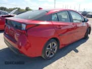 ✅ 2021 Toyota Prius LE • VIN: JTDKAMFU0M3142456 • Lot: 43447432. Wystawiony na IAAI z przebiegiem 32 473 mil. Bezpłatny archiwum sprzedaży aukcyjnych z USA i szczegółowy raport historii pojazdu na DreamBid. Zdjęcie 4.