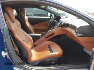 ✅ 2021 Ferrari Roma • VIN: ZFF98RNA9M0265061 • Lot: 42301801. Wystawiony na IAAI z przebiegiem 5 155 mil. Bezpłatny archiwum sprzedaży aukcyjnych z USA i szczegółowy raport historii pojazdu na DreamBid. Zdjęcie 5.