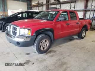2005 Dodge Dakota SLT с VIN 1D7HE48K95S293853, выставлен на аукционе Copart как лот 69125054 с пробегом 162 554 миль миль и Списание • Salvage title. История ставок и продаж доступна на DreamBid. Изображение 1.