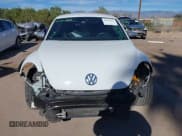 ✅ 2016 Volkswagen Beetle Dune • VIN: 3VWS17AT8GM632868 • Lot: 43810321. Listed on IAAI with 75,311 mi. Free auction sales archive from the USA and detailed vehicle history report at DreamBid. Image 13.