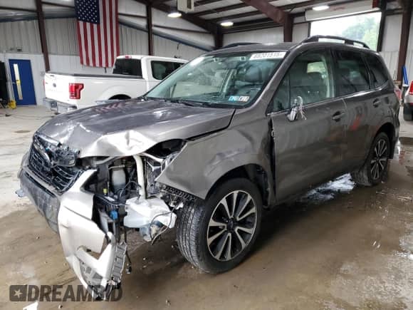 2018 Subaru Forester Touring с VIN JF2SJGWC8JH421727, выставлен на аукционе Copart как лот 68201515 с пробегом 84 424 миль миль и Списание • Salvage title. История ставок и продаж доступна на DreamBid. Изображение 1.