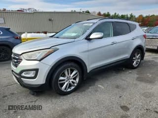 ✅ 2014 Hyundai Santa Fe • VIN: 5XYZU3LAXEG186634 • Lot: 92138965. Wystawiony na Copart z przebiegiem 125 241 mil. Bezpłatny archiwum sprzedaży aukcyjnych z USA i szczegółowy raport historii pojazdu na DreamBid. Zdjęcie 1.