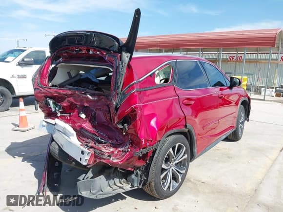 ✅ 2018 Lexus RX 350L Premium • VIN: JTJGZKCA9J2003227 • Лот: 41793170. Опубликован ранее на IAAI с пробегом 97 907 миль. Бесплатный доступ к архиву аукционных продаж из США и подробный отчёт об истории автомобиля на DreamBid. Изображение 4.