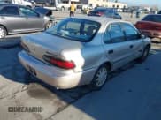 ✅ 1995 Chevrolet Prizm • VIN: 1Y1SK5283SZ021860 • Lot: 43917334. Wystawiony na IAAI z przebiegiem 242 285 mil. Bezpłatny archiwum sprzedaży aukcyjnych z USA i szczegółowy raport historii pojazdu na DreamBid. Zdjęcie 4.
