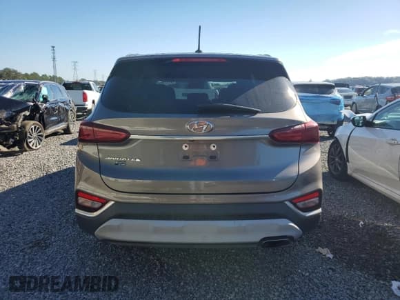 ✅ 2019 Hyundai Santa Fe SE • VIN: 5NMS23AD9KH101451 • Lot: 91171595. Listed on Copart with 127,277 mi. Free auction sales archive from the USA and detailed vehicle history report at DreamBid. Image 6.