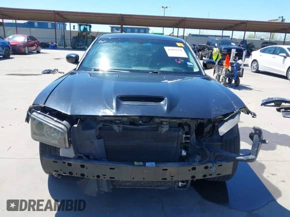 2009 Dodge Charger SRT-8 с VIN 2B3LA73W29H568764, выставлен на аукционе IAAI как лот 41869358 с пробегом 96 029 миль миль и . История ставок и продаж доступна на DreamBid. Изображение 13.