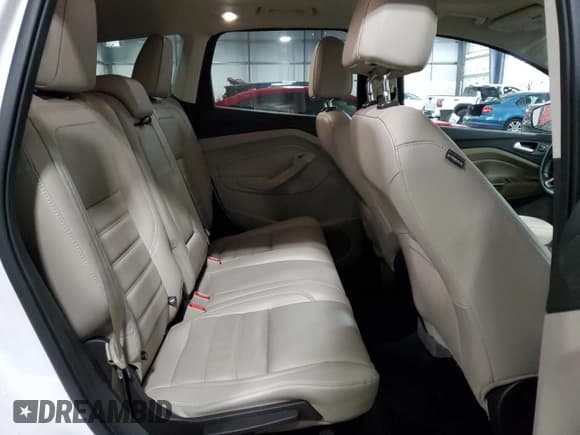 ✅ 2017 Ford Escape Titanium • VIN: 1FMCU0JD3HUD40648 • Lot: 90056455. Wystawiony na Copart z przebiegiem 69 569 mil. Bezpłatny archiwum sprzedaży aukcyjnych z USA i szczegółowy raport historii pojazdu na DreamBid. Zdjęcie 11.