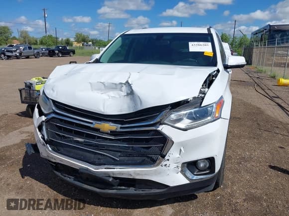 ✅ 2019 Chevrolet Traverse LT Cloth • VIN: 1GNERGKW9KJ201082 • Lot: 43286205. Wystawiony na IAAI z przebiegiem 101 797 mil. Bezpłatny archiwum sprzedaży aukcyjnych z USA i szczegółowy raport historii pojazdu na DreamBid. Zdjęcie 6.