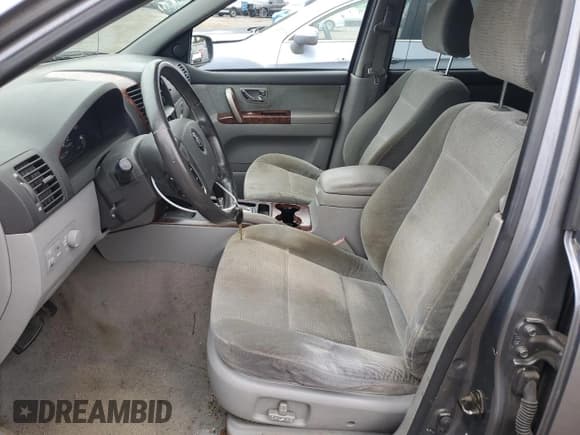 ✅ 2004 Kia Sorento LX • VIN: KNDJC733345233583 • Лот: 69924005. Опубликован ранее на Copart с пробегом 86 324 миль. Бесплатный доступ к архиву аукционных продаж из США и подробный отчёт об истории автомобиля на DreamBid. Изображение 7.