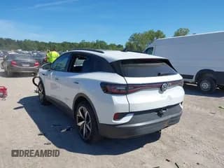 ✅ 2023 Volkswagen ID.4 Pro S • VIN: 1V2WNPE85PC021386 • Лот: 42943667. Опубликован ранее на IAAI с пробегом 26 511 миль. Бесплатный доступ к архиву аукционных продаж из США и подробный отчёт об истории автомобиля на DreamBid. Изображение 3.