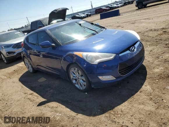 2015 Hyundai Veloster z VIN KMHTC6AD0FU241885, wystawiony jako Copart lot #70447094 z przebiegiem 175 075 mil mil oraz Szkoda całkowita • Salvage title. Historia ofert i sprzedaży dostępna na DreamBid. Obrazek 4.