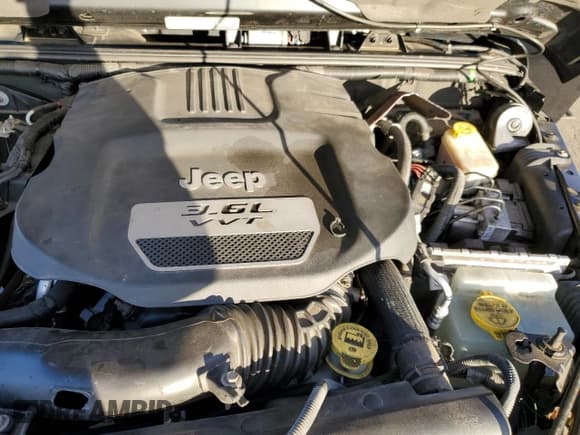 ✅ 2013 Jeep Wrangler Unlimited Sahara • VIN: 1C4HJWEG7DL667824 • Lot: 91671185. Listed on Copart with 120,735 mi. Free auction sales archive from the USA and detailed vehicle history report at DreamBid. Image 12.