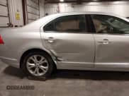 ✅ 2012 Ford Fusion SE • VIN: 3FAHP0HA5CR310151 • Lot: 43555561. Wystawiony na IAAI z przebiegiem 91 978 mil. Bezpłatny archiwum sprzedaży aukcyjnych z USA i szczegółowy raport historii pojazdu na DreamBid. Zdjęcie 21.