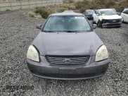 ✅ 2008 Kia Optima EX • VIN: KNAGE124185215405 • Lot: 70379555. Listed on Copart with 220,509 mi. Free auction sales archive from the USA and detailed vehicle history report at DreamBid. Image 5.