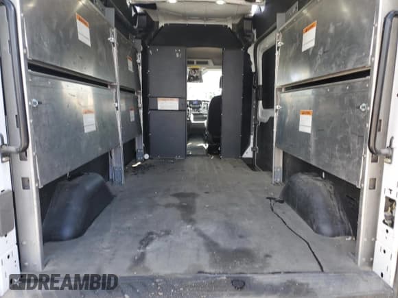 ✅ 2023 Ford Transit Cargo • VIN: 1FTBR2X88PKA66512 • Лот: 58451445. Опубликован ранее на Copart с пробегом 74 819 миль. Бесплатный доступ к архиву аукционных продаж из США и подробный отчёт об истории автомобиля на DreamBid. Изображение 10.