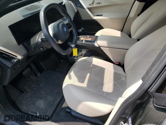 ✅ 2023 BMW iX • VIN: WB513CF06PCK76448 • Lot: 64732925. Listed on Copart with 103,966 mi. Free auction sales archive from the USA and detailed vehicle history report at DreamBid. Image 7.