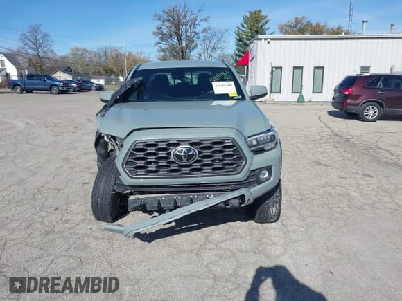 ✅ 2022 Toyota Tacoma TRD Off Road • VIN: 3TYDZ5BN1NT015418 • Lot: 43649466. Listed on IAAI with 58,704 mi. Free auction sales archive from the USA and detailed vehicle history report at DreamBid. Image 13.