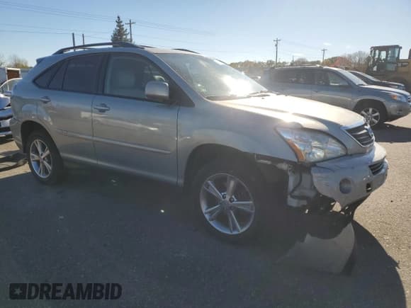 ✅ 2007 Lexus RX 400h • VIN: JTJGW31U272002215 • Лот: 90912615. Опубликован ранее на Copart с пробегом 211 493 миль. Бесплатный доступ к архиву аукционных продаж из США и подробный отчёт об истории автомобиля на DreamBid. Изображение 4.