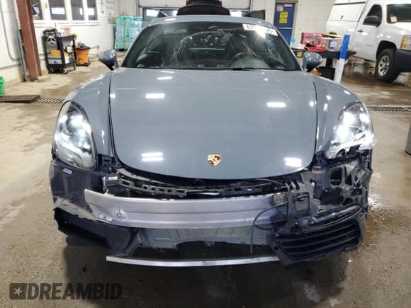 ✅ 2017 Porsche 718 Cayman • VIN: WP0AA2A86HS270870 • Lot: 62981095. Wystawiony na Copart z przebiegiem 59 118 mil. Bezpłatny archiwum sprzedaży aukcyjnych z USA i szczegółowy raport historii pojazdu na DreamBid. Zdjęcie 5.