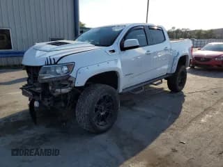 ✅ 2018 Chevrolet Colorado 4WD Z71 • VIN: 1GCGTDENXJ1306345 • Лот: 43760073. Опубликован ранее на Copart с пробегом 60 051 миль. Бесплатный доступ к архиву аукционных продаж из США и подробный отчёт об истории автомобиля на DreamBid. Изображение 1.