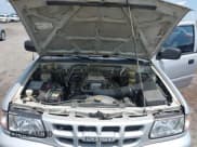 ✅ 2001 Isuzu Rodeo S • VIN: 4S2CK58W914357933 • Lot: 42427142. Listed on IAAI with 129,131 mi. Free auction sales archive from the USA and detailed vehicle history report at DreamBid. Image 10.