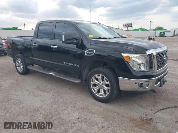 ✅ 2017 Nissan Titan SV • VIN: 1N6AA1F20HN552819 • Lot: 42005141. Listed on IAAI with 139,799 mi. Free auction sales archive from the USA and detailed vehicle history report at DreamBid. Image 1.