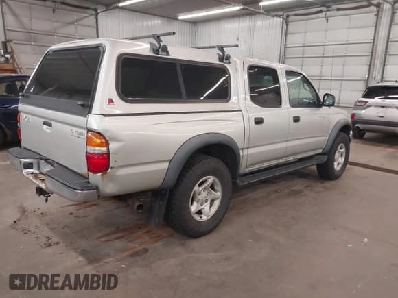 ✅ 2001 Toyota Tacoma PreRunner • VIN: 5TEGN92N51Z845148 • Lot: 42210630. Listed on IAAI with 387,766 mi. Free auction sales archive from the USA and detailed vehicle history report at DreamBid. Image 4.