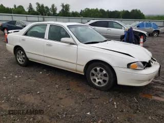 ✅ 2001 Mazda 626 LX • VIN: 1YVGF22C515251837 • Лот: 56854605. Опубликован ранее на Copart с пробегом 173 148 миль. Бесплатный доступ к архиву аукционных продаж из США и подробный отчёт об истории автомобиля на DreamBid. Изображение 4.