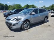 ✅ 2012 Mazda CX-9 Grand Touring • VIN: JM3TB3DVXC0345949 • Lot: 68523875. Wystawiony na Copart z przebiegiem 144 476 mil. Bezpłatny archiwum sprzedaży aukcyjnych z USA i szczegółowy raport historii pojazdu na DreamBid. Zdjęcie 1.