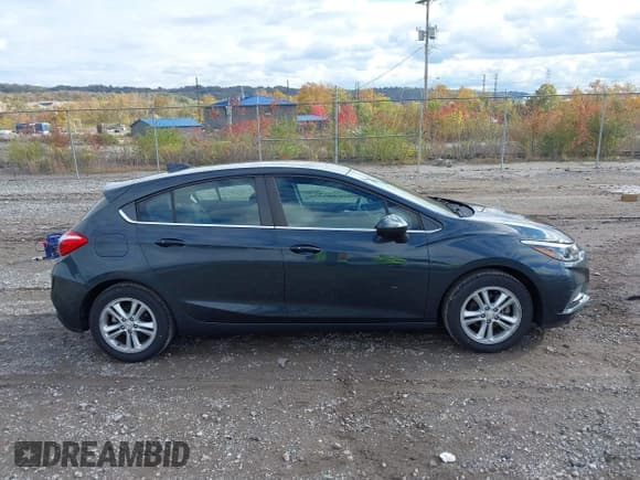 ✅ 2017 Chevrolet Cruze LT • VIN: 3G1BE6SM4HS516419 • Lot: 43594135. Listed on IAAI with 54,908 mi. Free auction sales archive from the USA and detailed vehicle history report at DreamBid. Image 13.