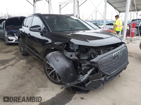 ✅ 2022 Audi Q4 e-tron Prestige • VIN: WA1M2BFZ8NP054541 • Lot: 42174760. Listed on IAAI with 21,515 mi. Free auction sales archive from the USA and detailed vehicle history report at DreamBid. Image 1.