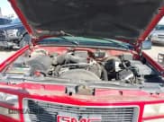 ✅ 1999 GMC Suburban • VIN: 1GKFK16RXXJ809823 • Lot: 41687406. Wystawiony na IAAI z przebiegiem 360 799 mil. Bezpłatny archiwum sprzedaży aukcyjnych z USA i szczegółowy raport historii pojazdu na DreamBid. Zdjęcie 10.