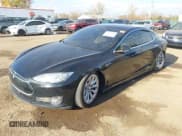 ✅ 2014 Tesla Model S P85D • VIN: 5YJSA1H26EFP64042 • Lot: 43591926. Listed on IAAI with 122,087 mi. Free auction sales archive from the USA and detailed vehicle history report at DreamBid. Image 2.