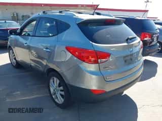 2012 Hyundai Tucson GLS with VIN KM8JU3AC9CU482947, listed as a IAAI auction lot 43502574 with 170,920 mi miles and . Bid and sale history available at DreamBid. Image 3.