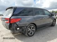 ✅ 2023 Honda Odyssey Touring • VIN: 5FNRL6H87PB005767 • Lot: 87379405. Listed on Copart with 42,579 mi. Free auction sales archive from the USA and detailed vehicle history report at DreamBid. Image 3.
