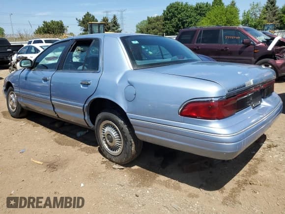 ✅ 1997 Mercury Grand Marquis GS • VIN: 2MELM74W7VX666594 • Lot: 54538874. Wystawiony na Copart z przebiegiem 101 742 mil. Bezpłatny archiwum sprzedaży aukcyjnych z USA i szczegółowy raport historii pojazdu na DreamBid. Zdjęcie 2.