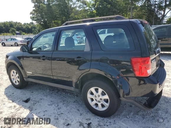✅ 2008 Mazda Tribute Sport • VIN: 4F2CZ06128KM18286 • Lot: 62360865. Listed on Copart with 90,823 mi. Free auction sales archive from the USA and detailed vehicle history report at DreamBid. Image 2.