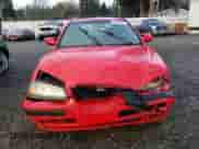 2004 Hyundai Elantra GT z VIN KMHDN56D34U104583, wystawiony jako Copart lot #82441094 z przebiegiem Nie podano mil oraz Szkoda całkowita • Salvage title. Historia ofert i sprzedaży dostępna na DreamBid. Obrazek 5.