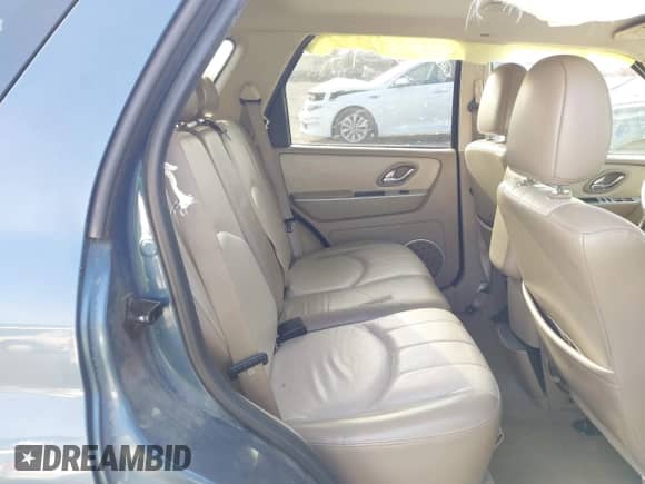 2006 Mercury Mariner Luxury с VIN 4M2CU57186DJ07953, выставлен на аукционе IAAI как лот 41756840 с пробегом 163 988 миль миль и . История ставок и продаж доступна на DreamBid. Изображение 8.