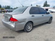 ✅ 2004 Mitsubishi Lancer ES • VIN: JA3AJ26E64U040399 • Lot: 43021343. Listed on IAAI with 197,944 mi. Free auction sales archive from the USA and detailed vehicle history report at DreamBid. Image 4.