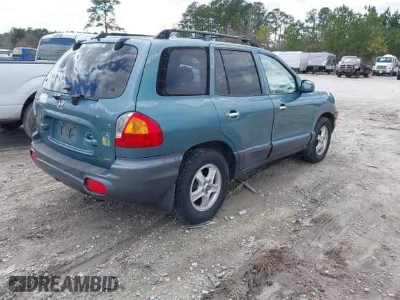 2002 Hyundai Santa Fe GLS with VIN KM8SC73D22U245851, listed as a IAAI auction lot 41733222 with 184,179 mi miles and . Bid and sale history available at DreamBid. Image 4.