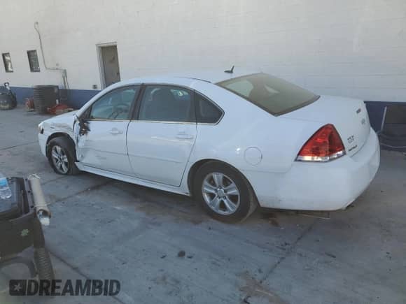 2013 Chevrolet Impala LS with VIN 2G1WF5E37D1184588, listed as a Copart auction lot 82370615 with 220,421 mi miles and Salvage title. Bid and sale history available at DreamBid. Image 2.