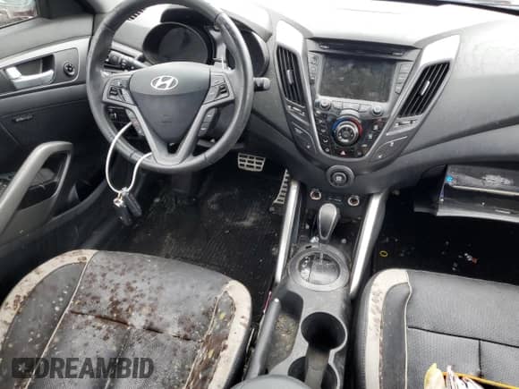 2013 Hyundai Veloster Turbo z VIN KMHTC6AE1DU124094, wystawiony jako Copart lot #74949224 z przebiegiem 97 268 mil mil oraz Szkoda całkowita • Salvage title. Historia ofert i sprzedaży dostępna na DreamBid. Obrazek 8.